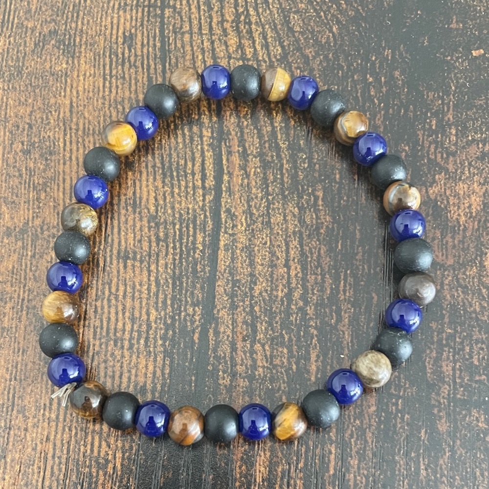 Tigers eye maybe Lapis